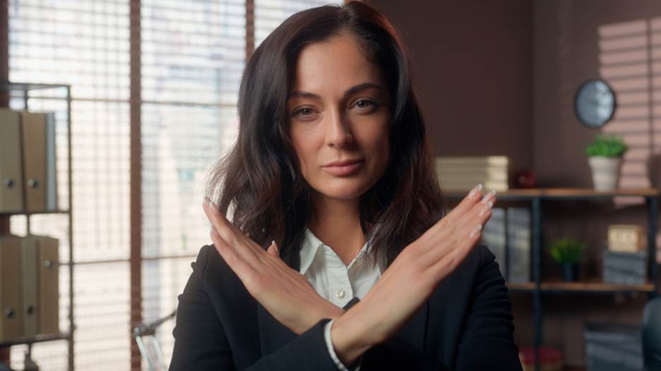 Woman crossing her arms in no shape - Sexual Discrimination